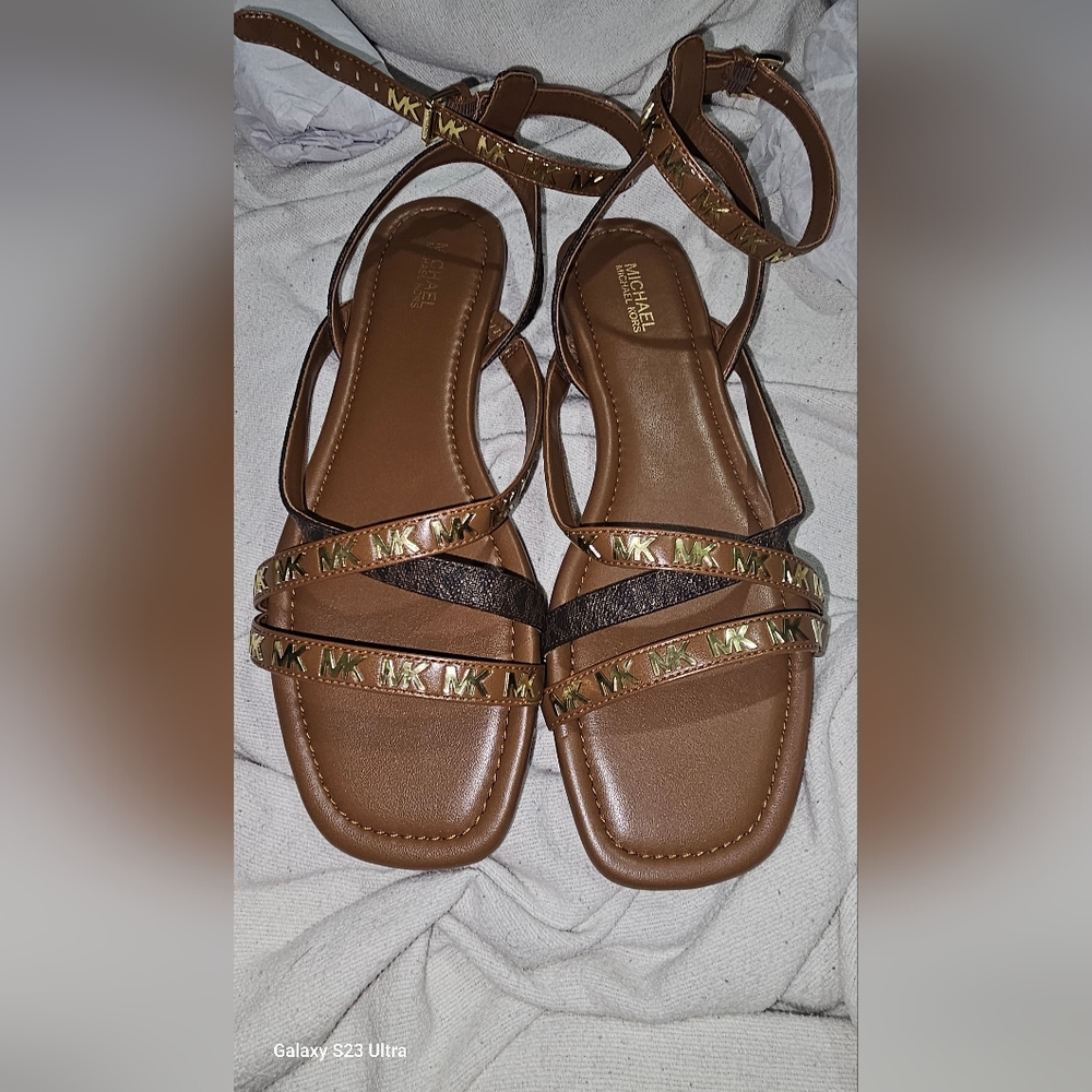 Strappy flat sandals by Michael kors